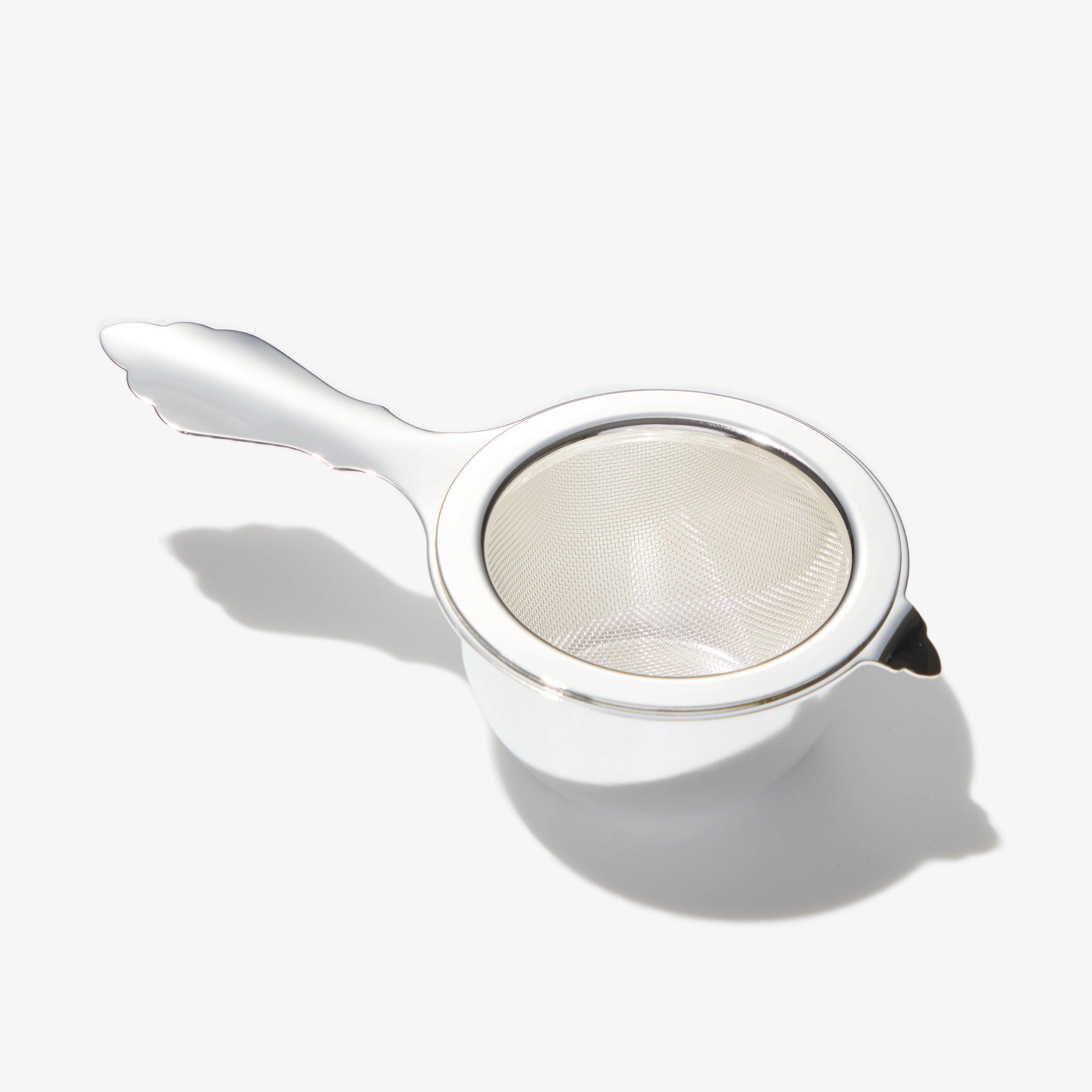 Stainless steel matcha sifter on white background